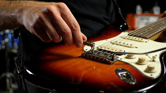 How to Use a Tremolo Bar for Dynamic Electric Guitar Effects: A Comprehensive Guide