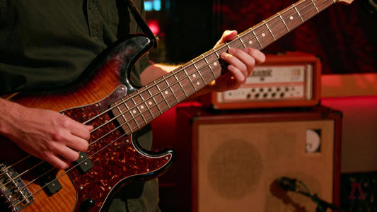 How to Master Bass Guitar Tapping: The Complete Guide